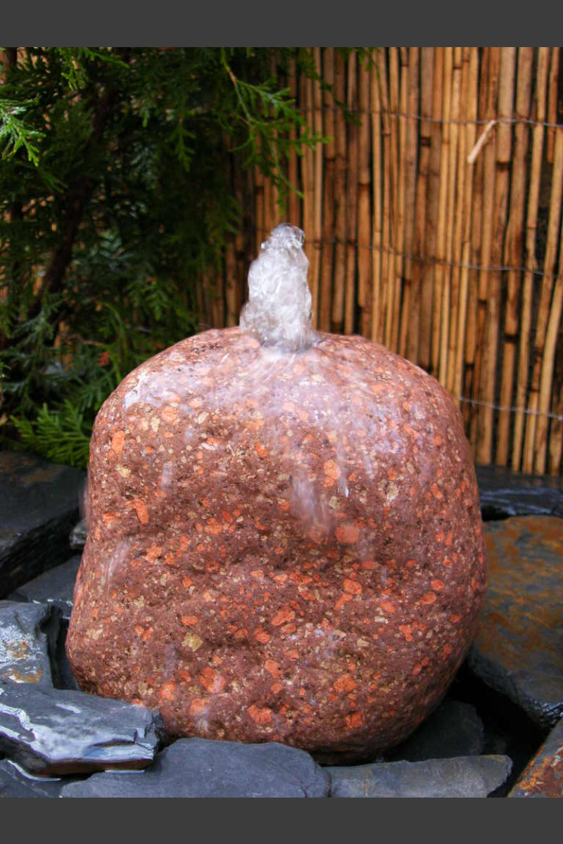 Findling Sprudelstein roter Granit 20cm - Findlinge Felsen - Quellsteine -  Quellstein - Monolithique