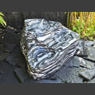 Bachlaufkaskaden Quellstein geschliffener Marmor schwarz-weiß