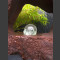 Lava Quellstein mit Durchbruch und drehender Glaskugel 10cm